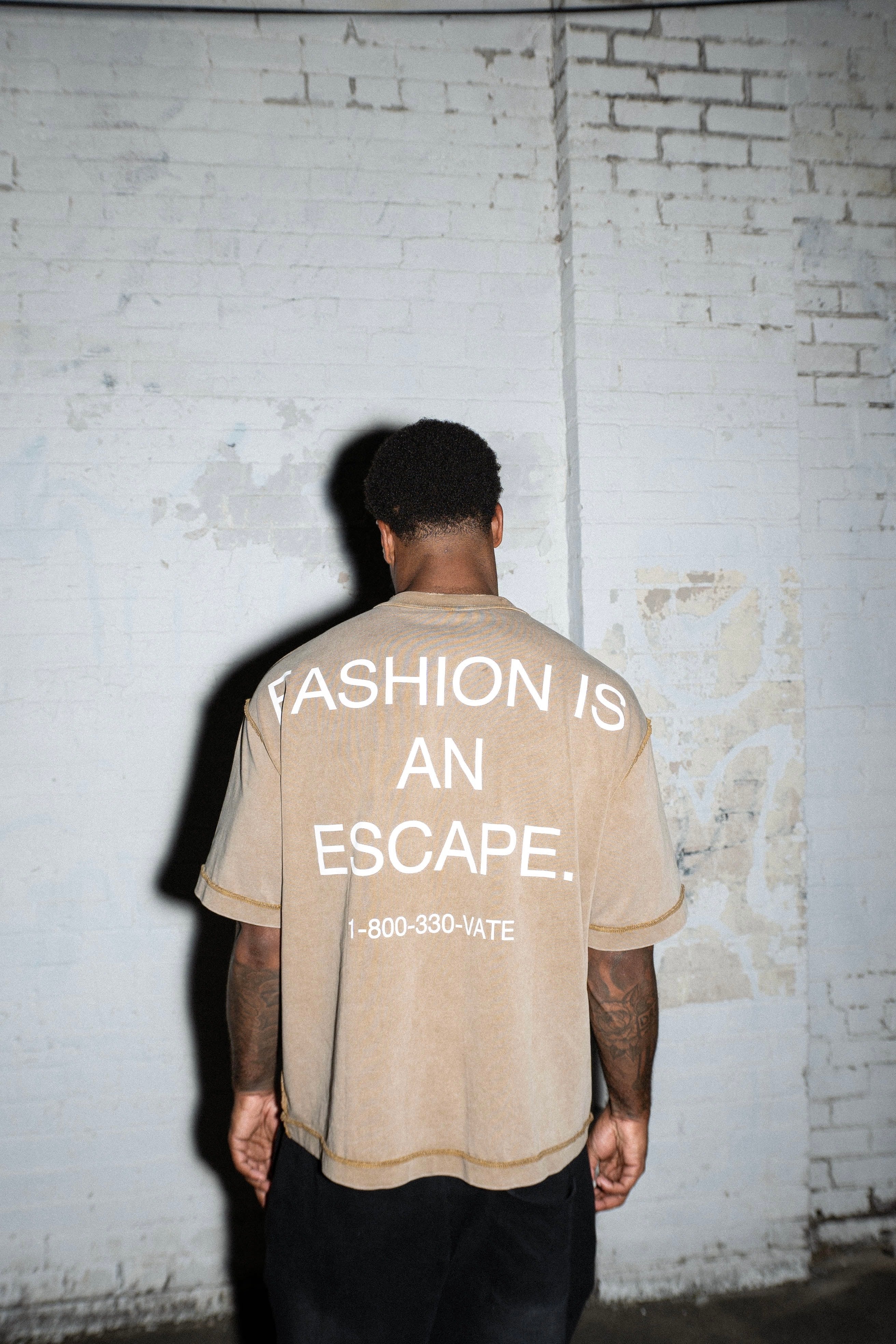 "FASHION IS AN ESCAPE" BOX CROP TEE